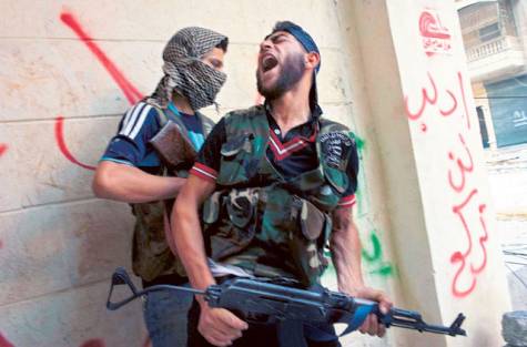 I GUERRIGLIERI AD ADRA IN SIRIA HANNO COMMESSO ATROCITA' CONTRO I CIVILI