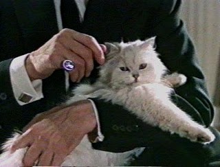 LA SPECTRE HA DECISO: PER BERLUSCONI PRONTO IL TRATTAMENTO BLOFELD
