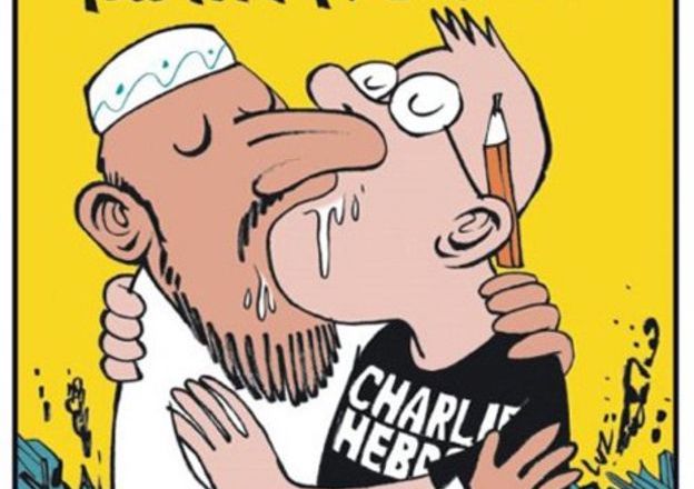 I razzisti di Charlie Hebdo ed il fango mediatico contro Julian Assange